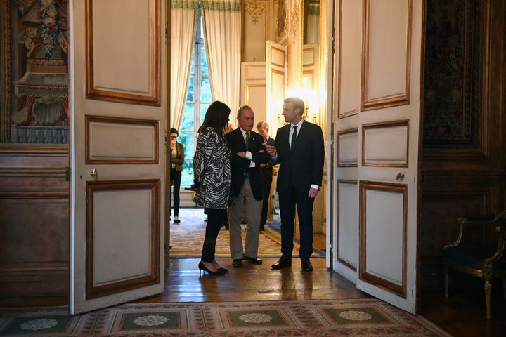  Climate crusaders: President Macron, right, with Paris Mayor Anne Hidalgo and former New York City mayor Michael Bloomberg after a June 2 meeting at the Elysee Palace, following the US withdrawal from the Paris agreement. 