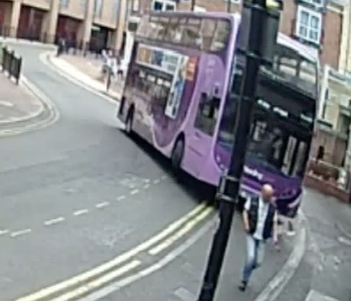 Simon Smith was crossing the road in Reading when a runaway bus tore around the corner behind him...