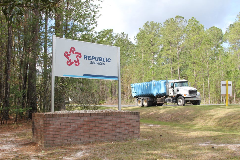 A waste-hauling truck leaves a landfill where Republic Services, the second largest waste management company in the Unit