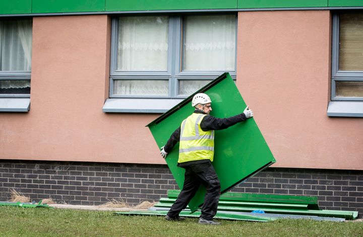 Cladding is removed from Hanover tower block in Sheffield, Yorkshire, after one element failed the new Government test.
