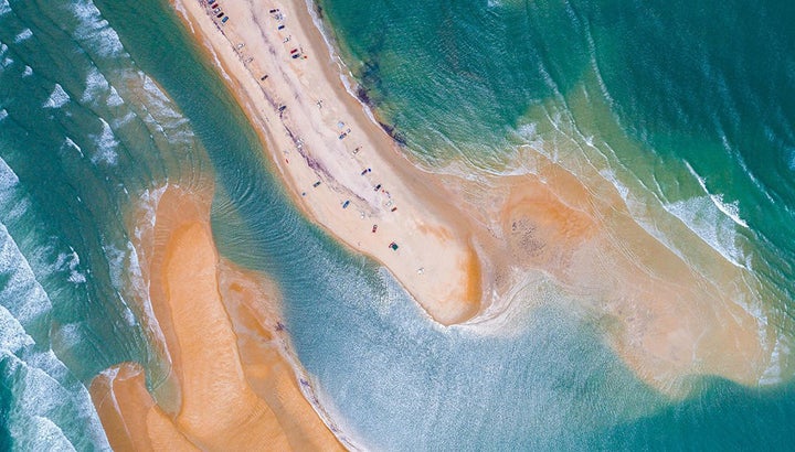 Local photographer Chad Koczera captured photos of the new island with a drone.