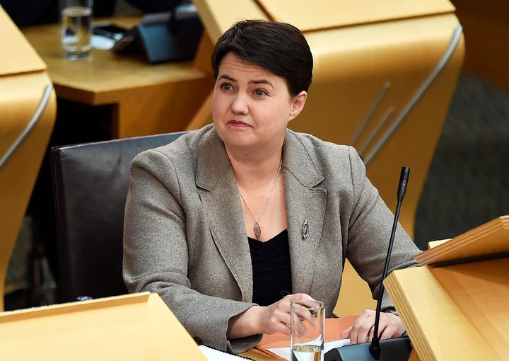 Ruth Davidson listens as Sturgeon speaks at Holyrood