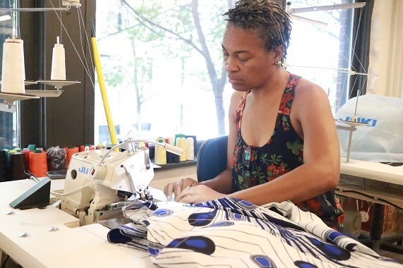<p>Saint Louis Fashion Incubator, Reuben’s seamstress Camille</p>