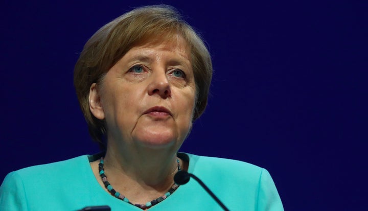 Angela Merkel says a visit to a lesbian couple changed her stance on gay marriage 