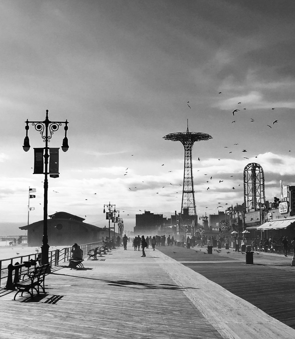 Maria K. Pianu. Pordenone, Italy. 3rd Place – The America I Know.“When in NY area, I like to take an out of season walk in Coney Island. This photo was taken during an Indian summer windy day, breathing the Ocean breeze and getting inspired by Coney Island decadent and old-school Brooklyn atmosphere.”