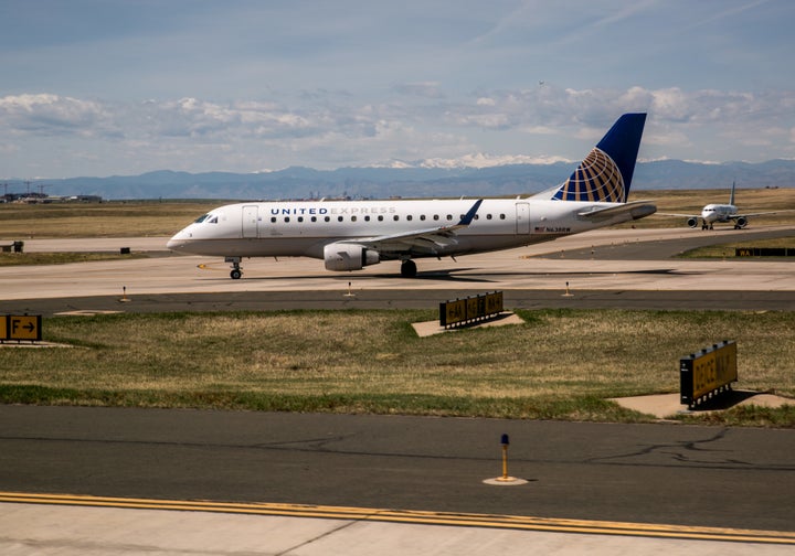 A baby reportedly overheated after sitting on a United Airlines flight that was delayed at Denver International Airport. 