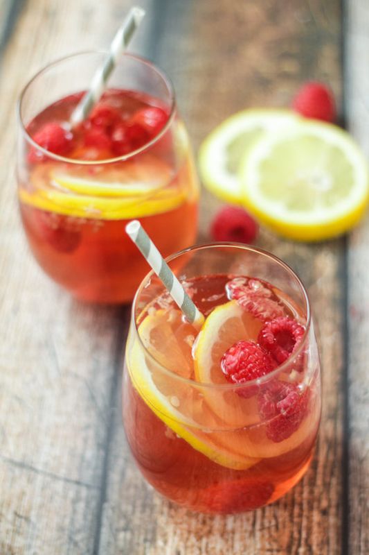 Get the Raspberry-Lemon Blush Sangria Spritzers recipe from The Wanderlust Kitchen