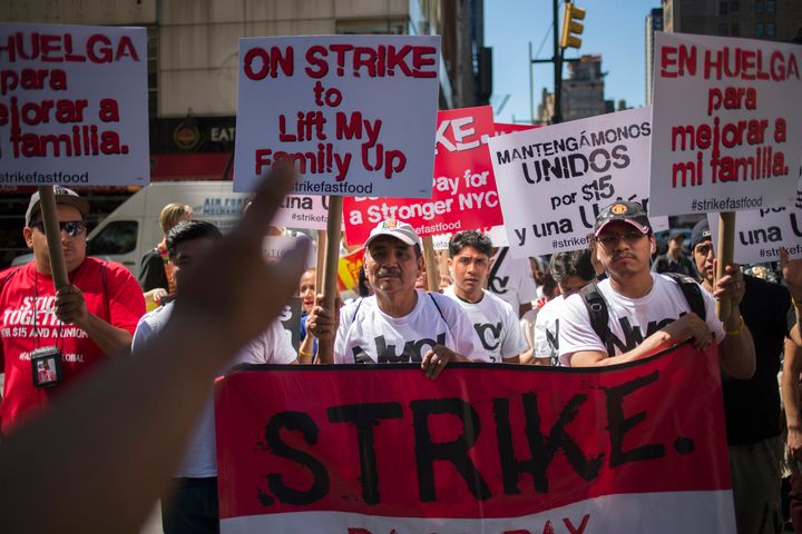 "Fight for $15" activists march in New York City on Sep. 4, 2014. A new study could give opponents of the $15 minimum wage new ammunition.