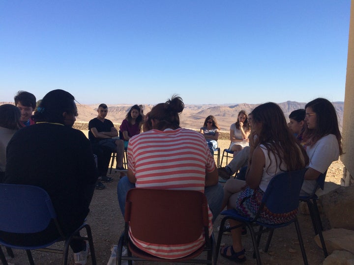 Jerusalem Youth Chorus members engaging in facilitated dialogue. 