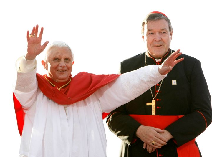 Pell looks on as Pope Benedict acknowledges the crowd of World Youth Day pilgrims in Sydney in July 2008