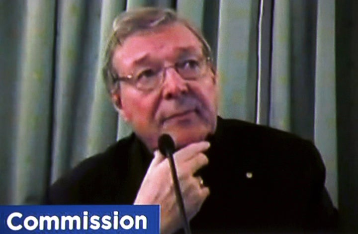 Pell is seen on screen via video link from Rome as he testifies at Australia's Royal Commission into Institutional Response to Child Sexual Abuse in Sydney, Australia, March 2016 - the Cardinal refused to travel to Australia to give evidence in person