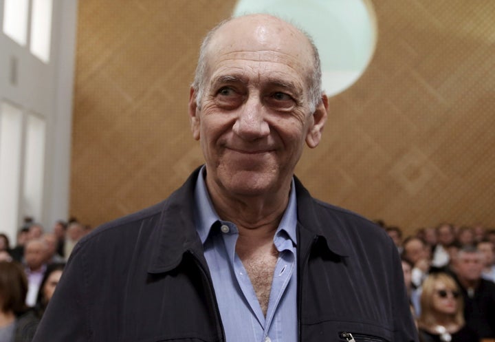 Although former Israeli Prime Minister Ehud Olmert won parole on Thursday, the release may be delayed if prosecutors dec
