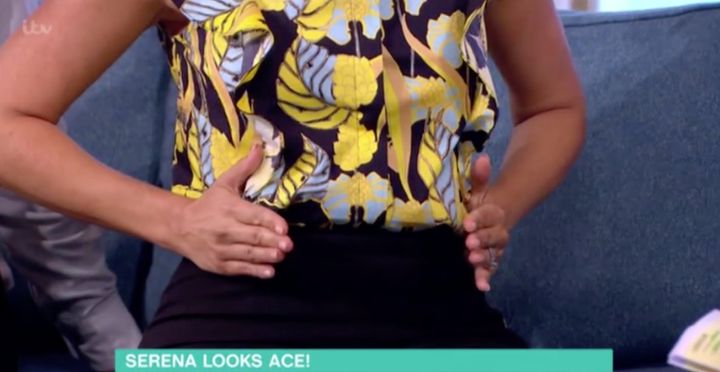 Holly Willoughby demonstrating what a bump looks like if you're expecting a girl.