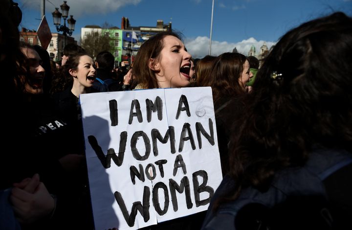 A woman protests in Dublin in March against Ireland's harsh abortion restrictions.
