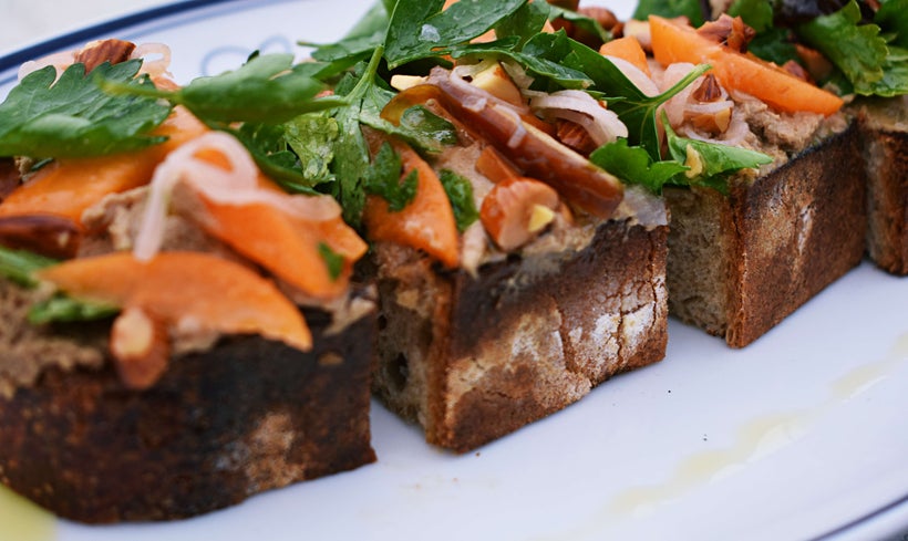 Catania’s duck liver mousse on country bread with seasonal garnishes