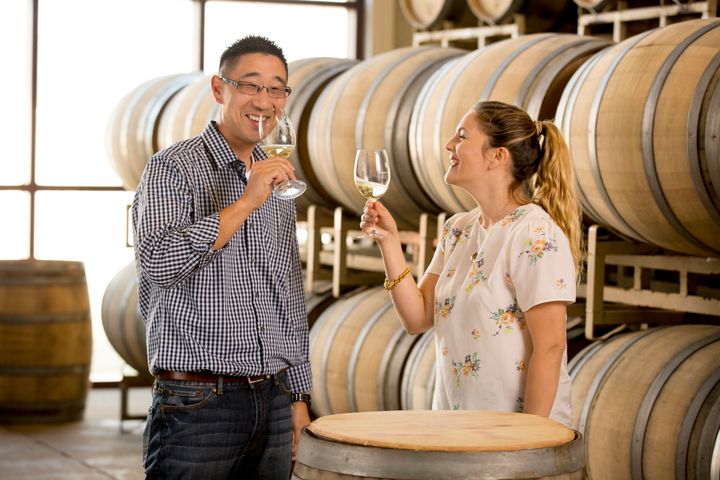 Kris Kato and Drew Barrymore in the barrel room.