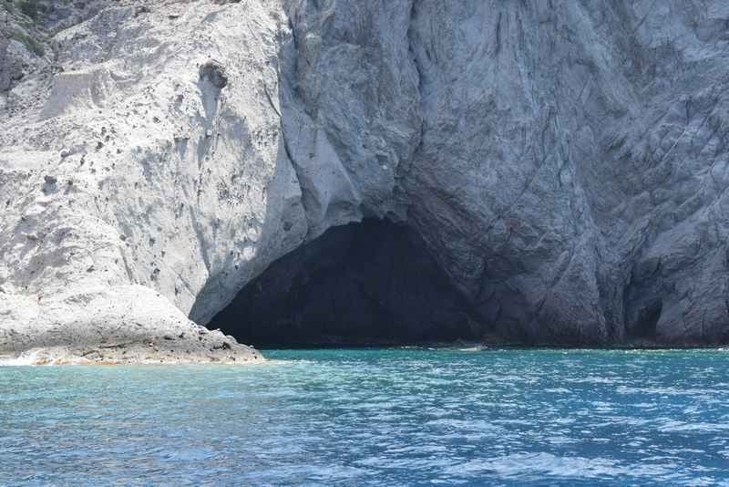 Caves and turquoise sea.
