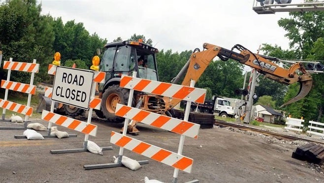 A crew conducts maintenance work on a railroad crossing in Chesterfield County, Virginia. Virginia’s Department of Transporta