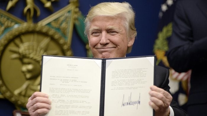 Trump signs Executive Order banning immigrants from 7 predominately Muslim countries.