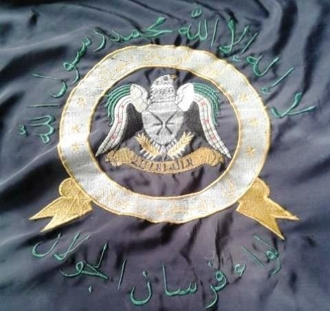 A photo of a flag belonging to Liwa Forsan al Joulan, a Syrian rebel faction operating in Quneitra.