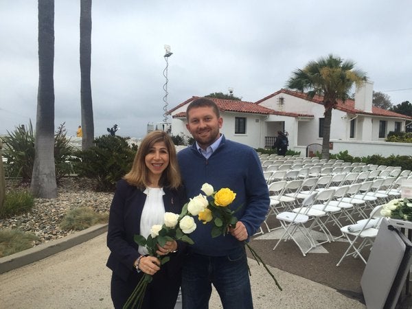 The author and Interim District Attorney Summer Stephan at sunrise on Memorial Day 2016 just before distributing thousands of roses on the graves at Fort Rosecrans National Cemetery 