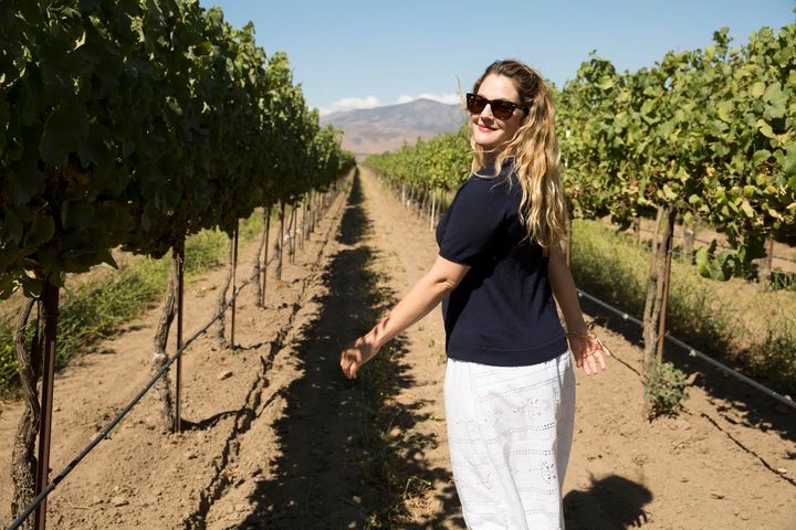 <p>Drew Barrymore walking the vineyards of Carmel Road.</p>