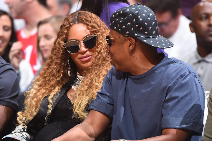 The couple took in a basketball game in April 2017, a few months before the birth of their twins.