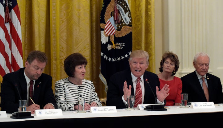  President Donald Trump speaks as he meets with Republican senators on health care in the East Room of the White House in Washington, Tuesday, June 27, 2017. Seated with him, from left, are Sen. Dean Heller, R-Nev., Sen. Susan Collins, R-Maine, Sen. Lisa Murkowski, R-Alaska, and Sen. Orrin Hatch, R-Utah. 