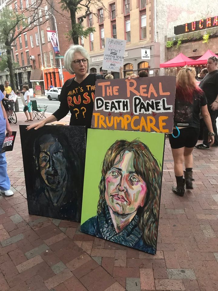The living hell that is insurance is driving this artist onto the streets to demonstrate with portrait stories and signs. Is healthcare a human right or not? If so then let’s fix this.