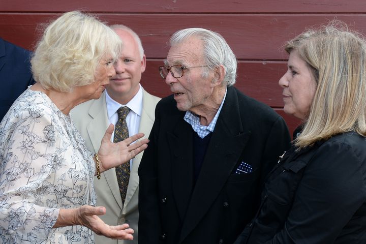 The Duchess of Cornwall meets war veteran Edward Rose who was incarcerated in with her father Major Bruce Shand