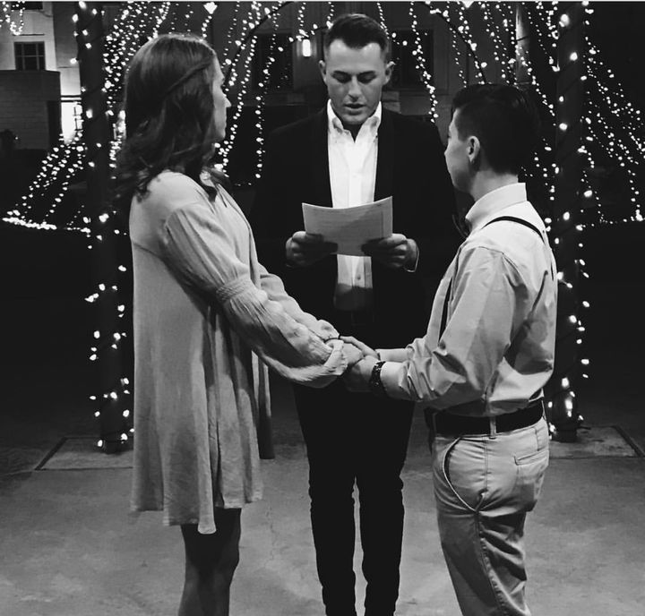 December 23, 2016, was wedding day for SrA Kayla Betts (nee Klasing, left) and Lauren Betts (right). The ceremony in Enid, Oklahoma, was officiated by Kayla’s brother, Ryan Klasing (center). “The way I explain it is that it’s all personality for me. She’s a great person,” SrA Betts says of her wife Lauren.