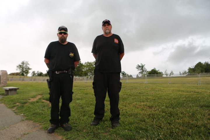 Billy Snuffer (right), the Imperial Wizard for the Rebel Brigade of the Knights of the Ku Klux Klan, stands on the Gettysburg Battlefield with another Klan member.