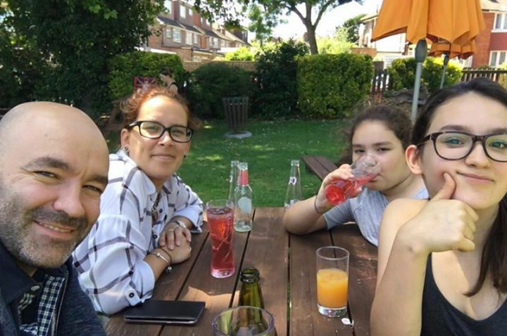 Marcio Gomes and Andreia Gomes (left) and their two daughters. 