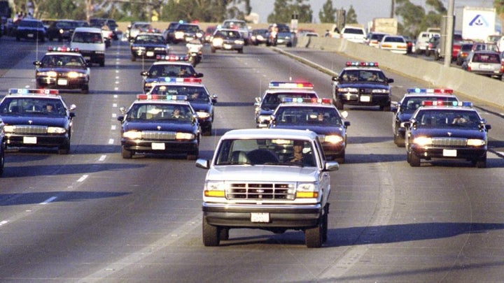 “California Highway Patrol units chase Al Cowlings, who is driving the white Bronco, and O.J. Simpson, hiding in the rear, on the 91 Freeway shortly after Simpson was charged in slayings.” -LA Times 