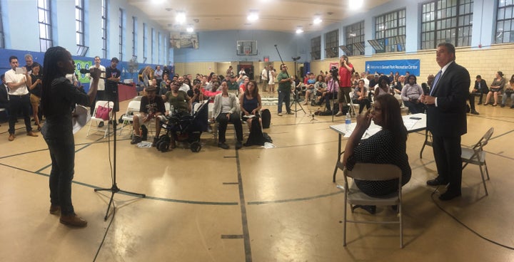 Alisha Williams of 5 Boro Defenders, grills Brooklyn DA Eric Gonzalez at the Sunset Park Broken Windows Town Hall