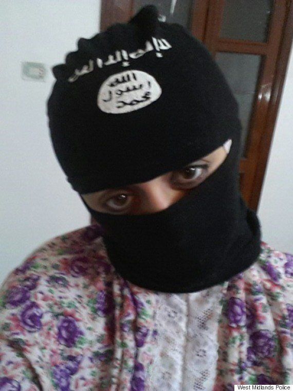 Tareena Shakil wearing a balaclava branded with the ISIS logo