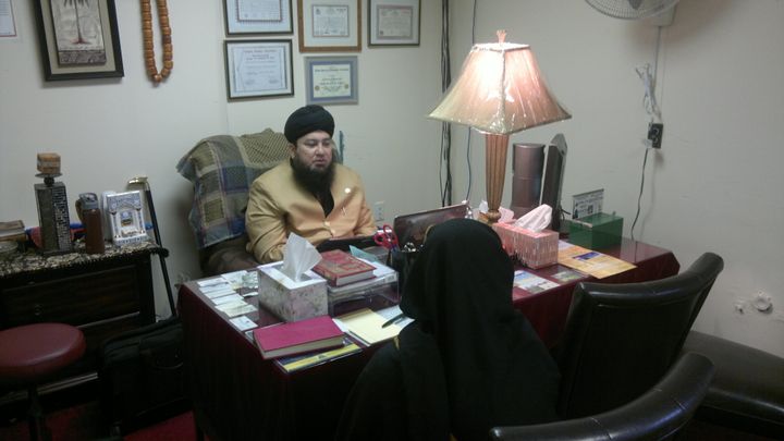 Mufti Muneer Akhoon counselling an American Muslim woman at the Islam Center of Hillside Avenue in Queens