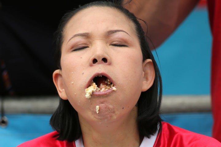 Sonya Thomas, pictured during Sunday's competition, came in third place after eating 31 hot dogs and buns.