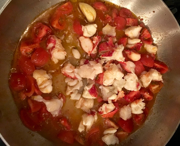 <p>The lobster should just warm through; if using cut-up raw shrimp, cook for 90 seconds at this stage</p>