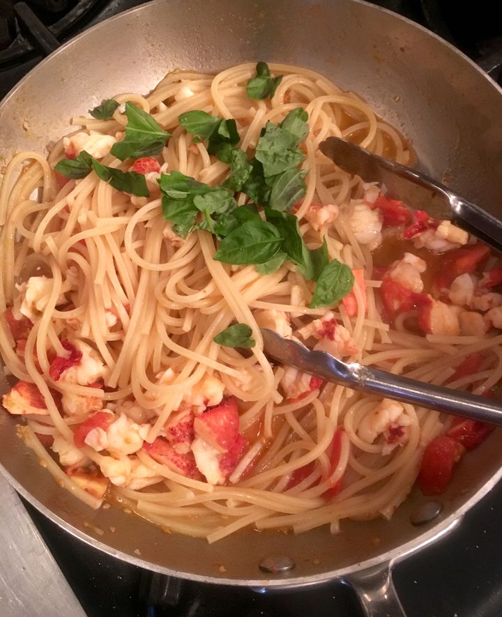 Spaghetti and basil added