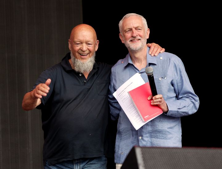 Glastonbury organiser Michael Eavis and Jeremy Corbyn on stage.