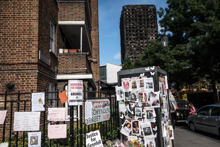 Tributes to those missing are left near Grenfell Tower on June 26, nearly two weeks after the fire