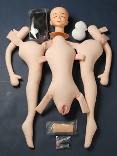  Sex doll with closed eyes. 