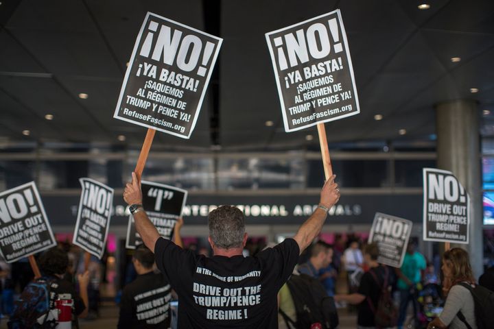 Activists protest on the first day of the the partial reinstatement of the Trump travel ban at Los Angeles International Airport, June 29, 2017.