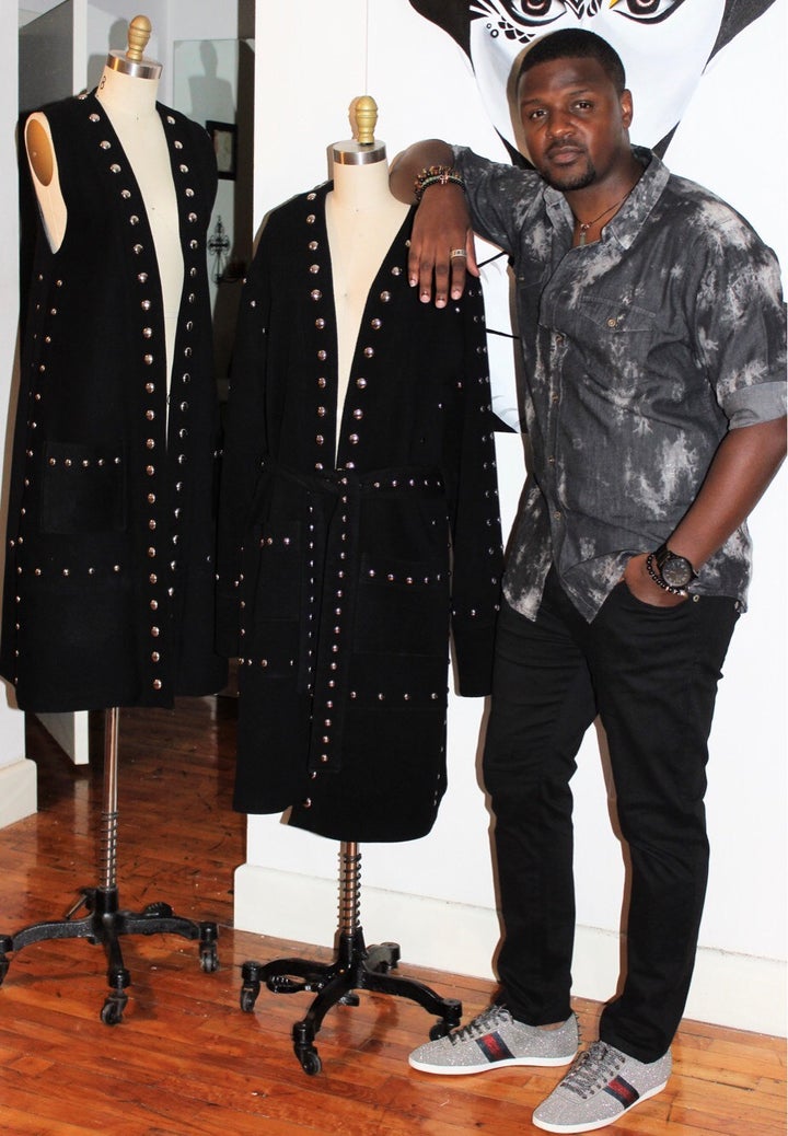 The Designer Venny Etienne with some pieces from his new Fall 2017 Collection Image via Mark541 Digital Media 