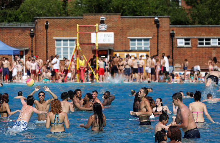 Swimmers enjoy Parliament Hill Lido on a sunny day in London in July 2016