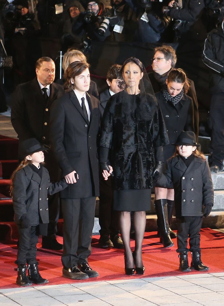 Dion with her children at Angelil's funeral. 