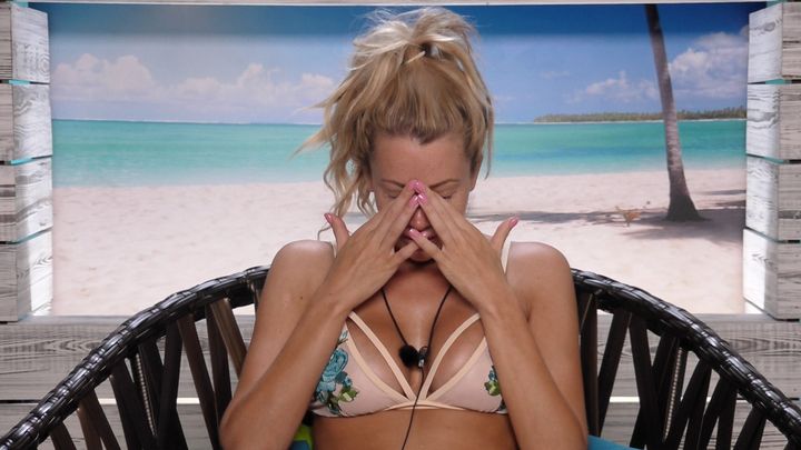 Olivia cries in the Beach Hut