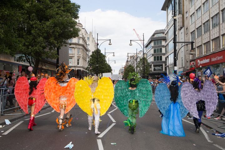 Participants take part in London's Pride parade last year