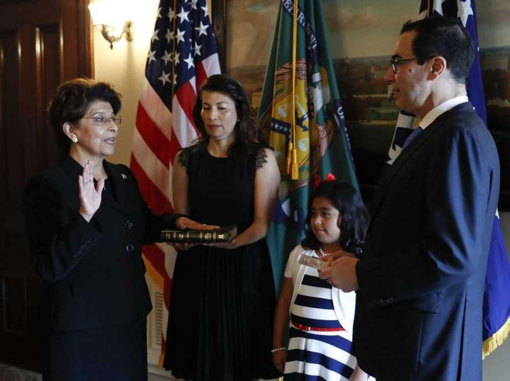<p>Treasury Secretary Steven Mnuchin, right, administer the oath of office to Jovita Carranza.</p>